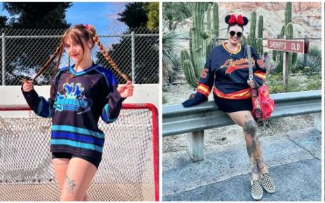 Oversized hockey jersey paired with high-top sneakers and slim jeans for a casual look