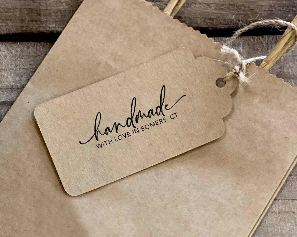Eco-friendly kraft envelope with custom rubber stamp and twine detail