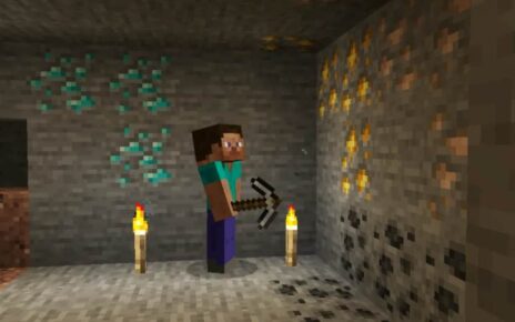 Minecraft player mining iron ore vein at Y=16 in deep cave with torches lit.